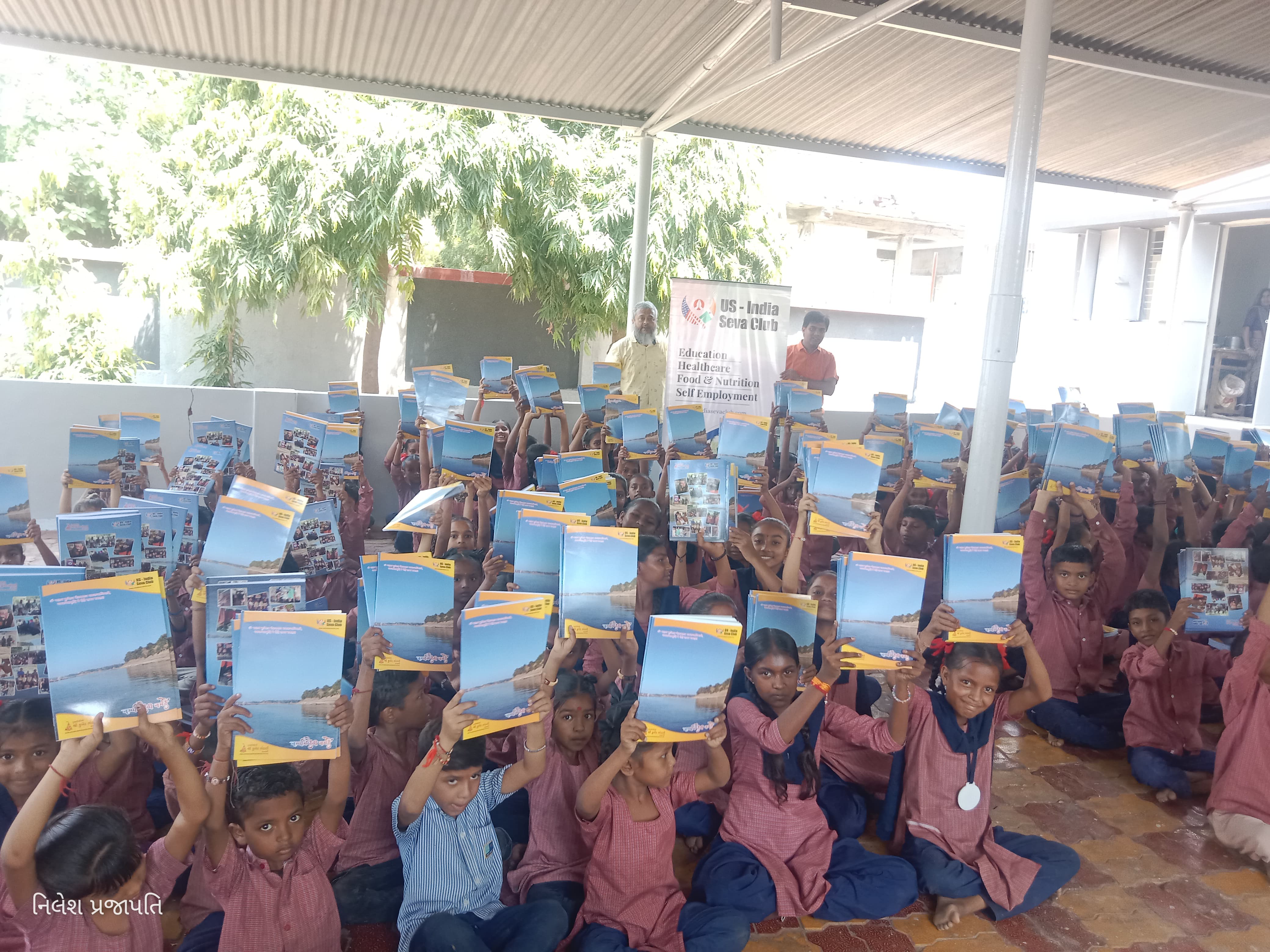 Notebook distribution at Manjarol Primary School 2026